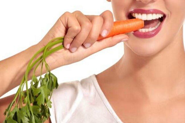 The girl ate coarse carrots